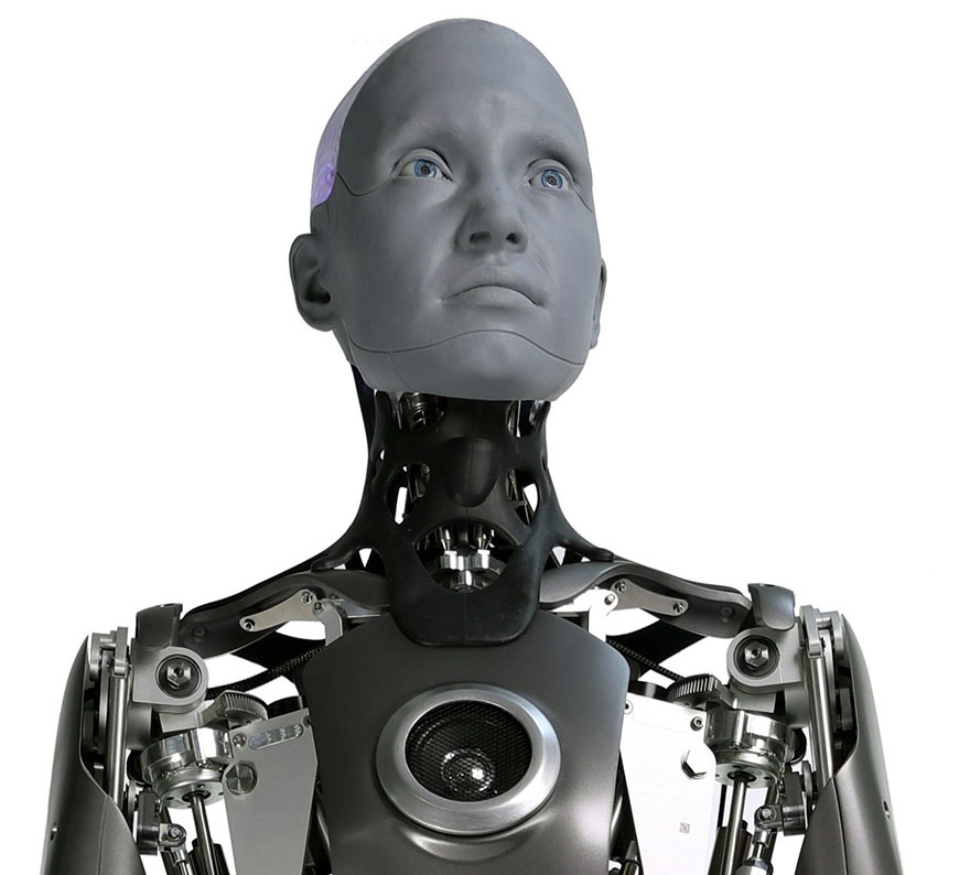Ameca, a realistic grey humanoid robot head with exposed mechanical neck and chest.